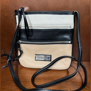 Calvin Klein leather tri color crossbody bag in tan, black, and cream.